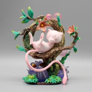 Figurine Pokémon lumineuse de Mew qui dort sur fond gris
